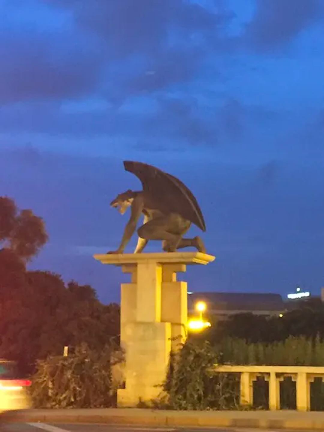 Cool gargoyle statue on a bridge in Valencia